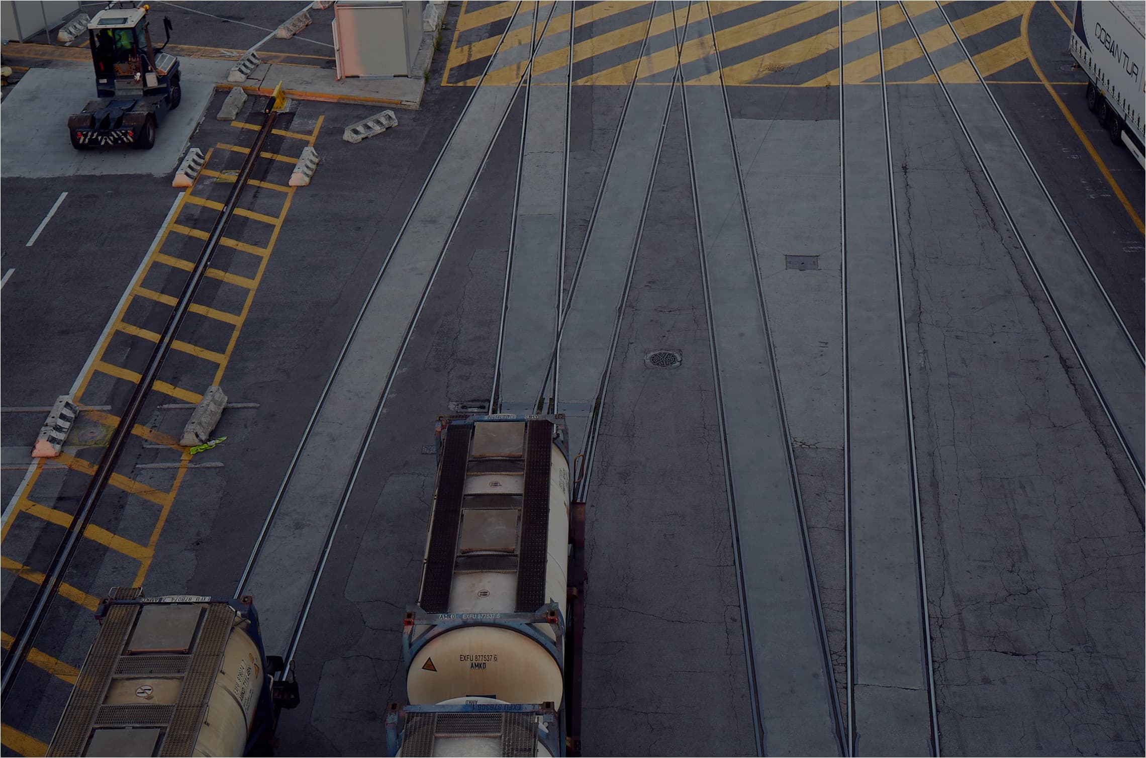 Aerial shot of cargo on rail transport at DFDS Trieste terminal.