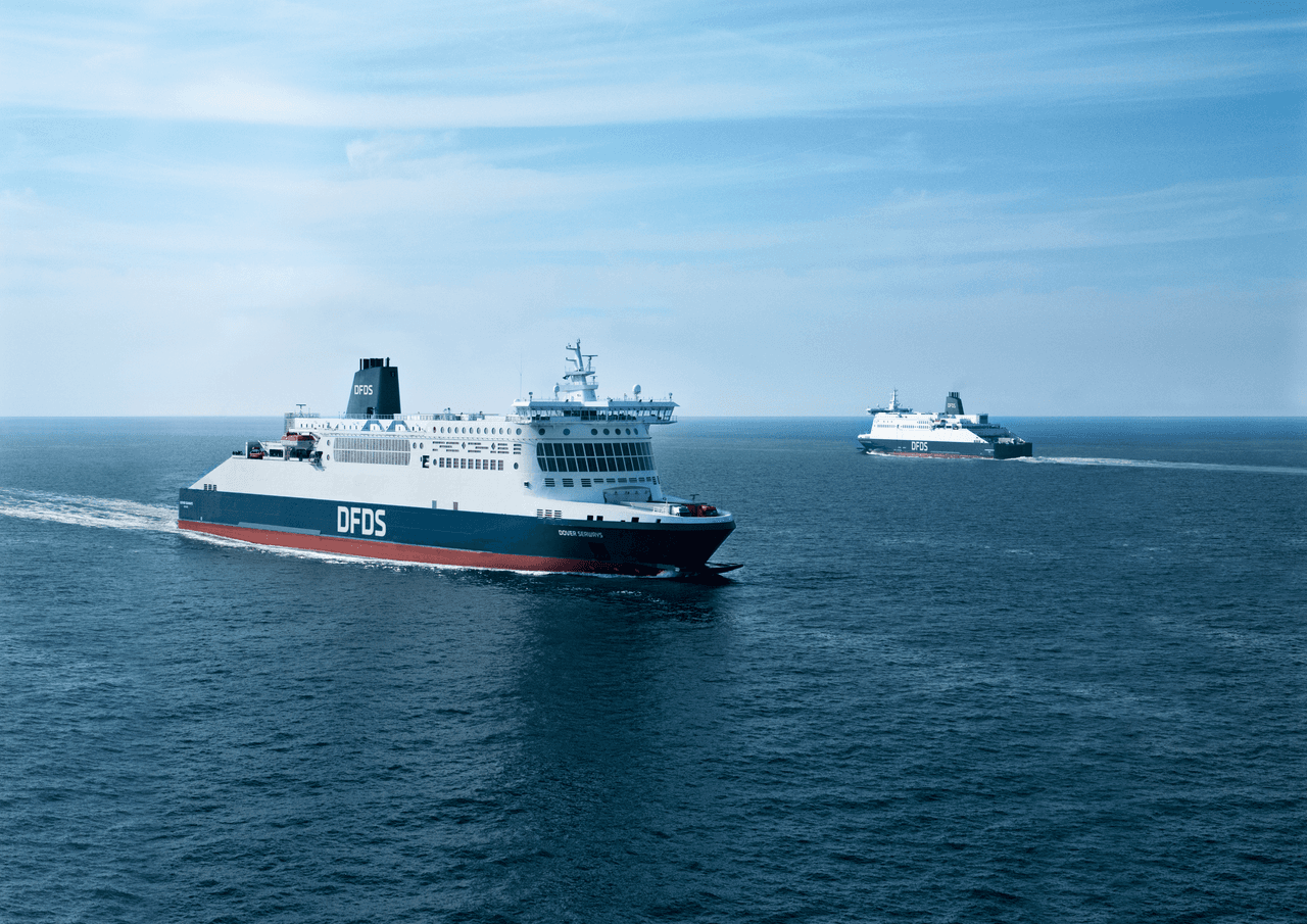 Picture of vessel Dover Seaways with new funnel at sea, with on the background another DFDS vessel