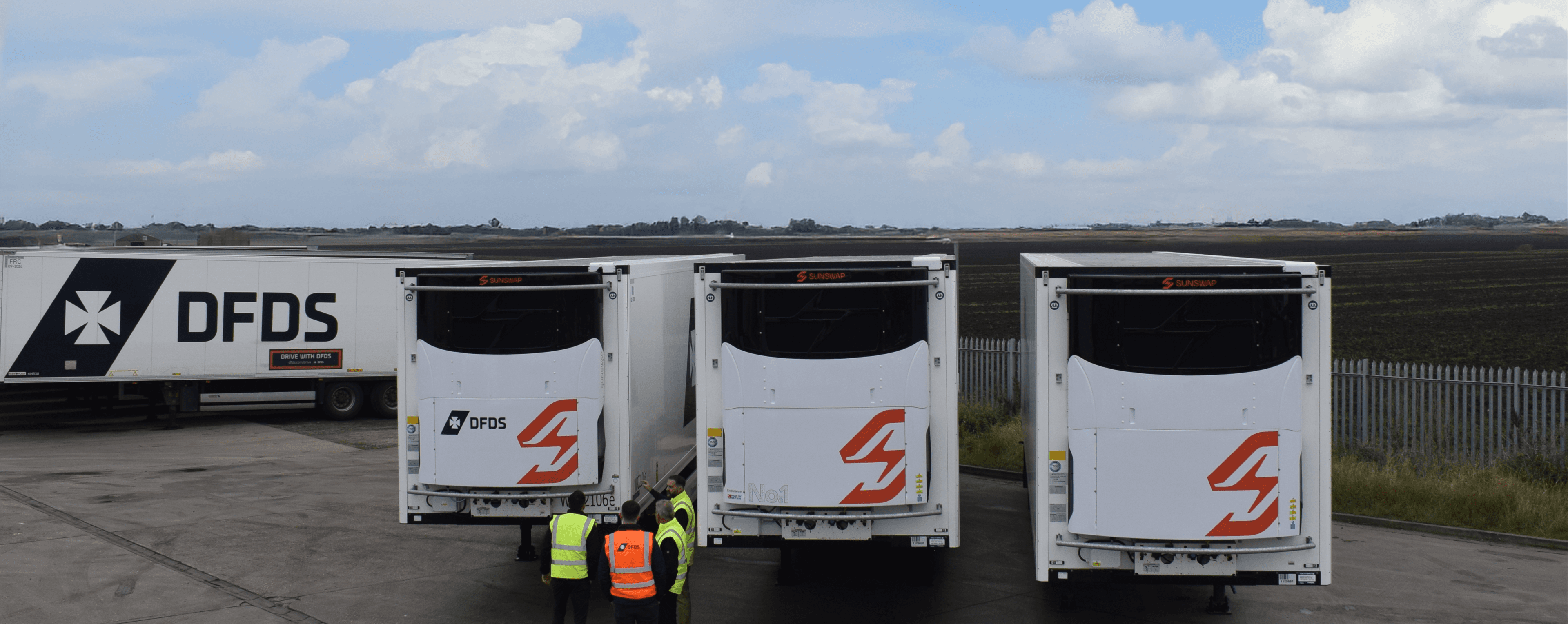 DFDS and Sunswap employees viewing the new trailers with new refrigerated transport solutions.