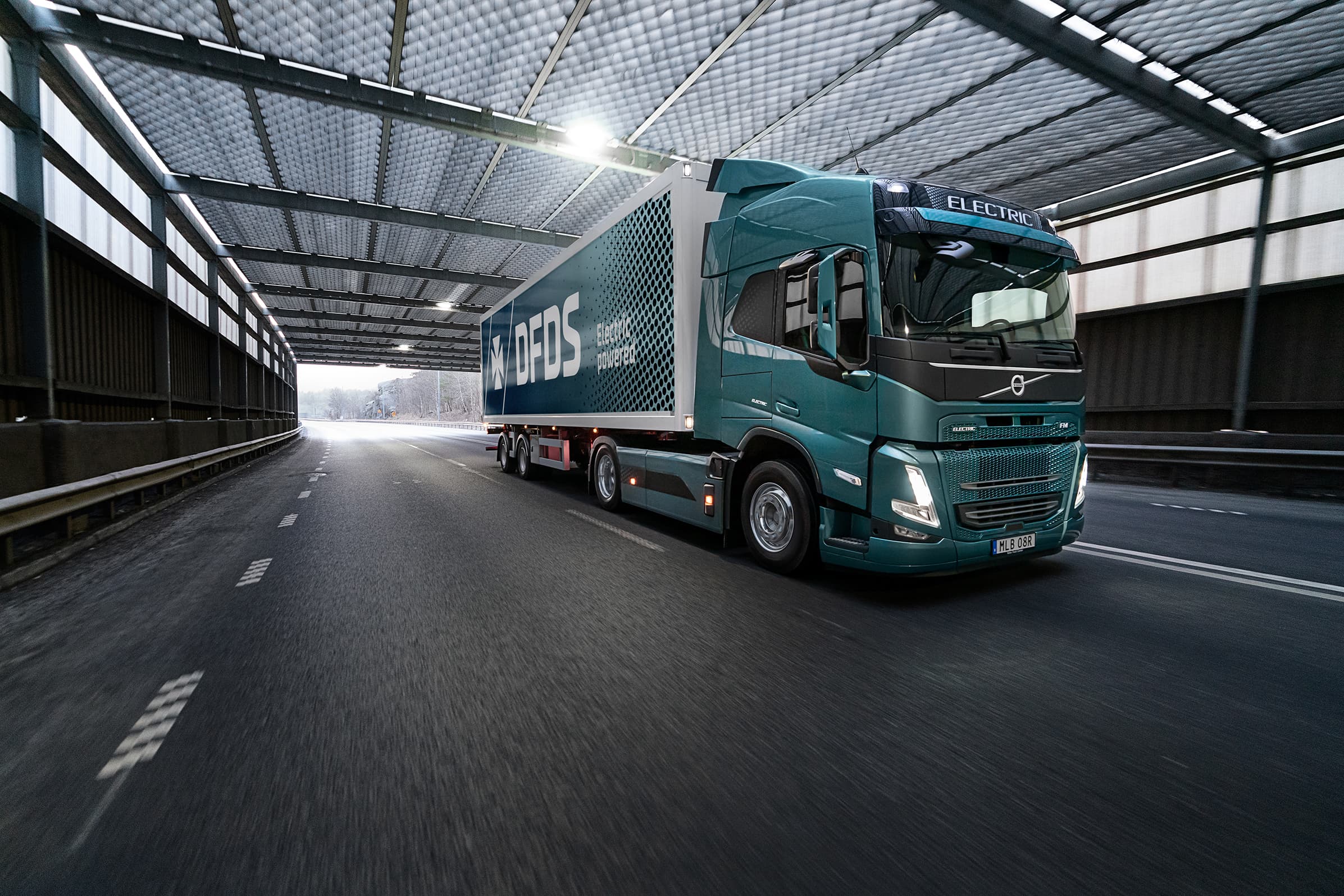 DFDS green electric truck in tunnel